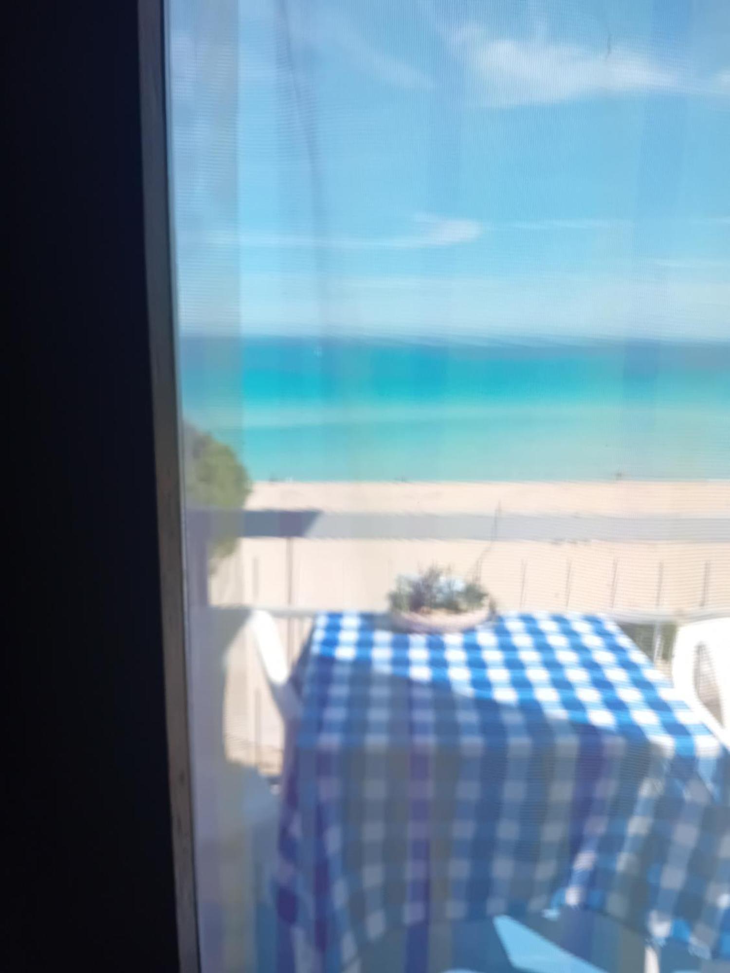 La Boutique Sul Mare Apartment Мондело Екстериор снимка